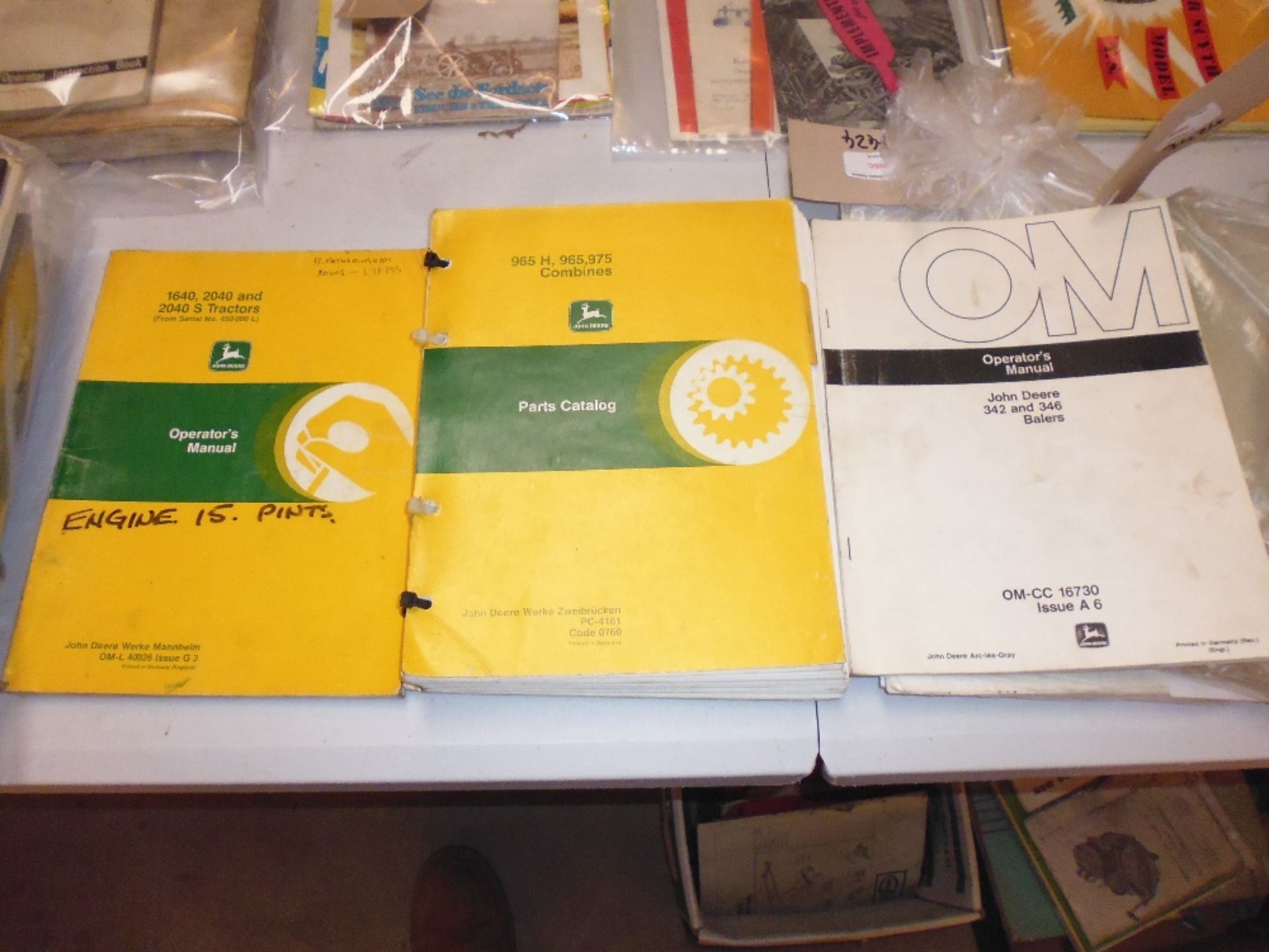 John Deere 24TS instruction book; John Deere 975 combine parts catalogue;