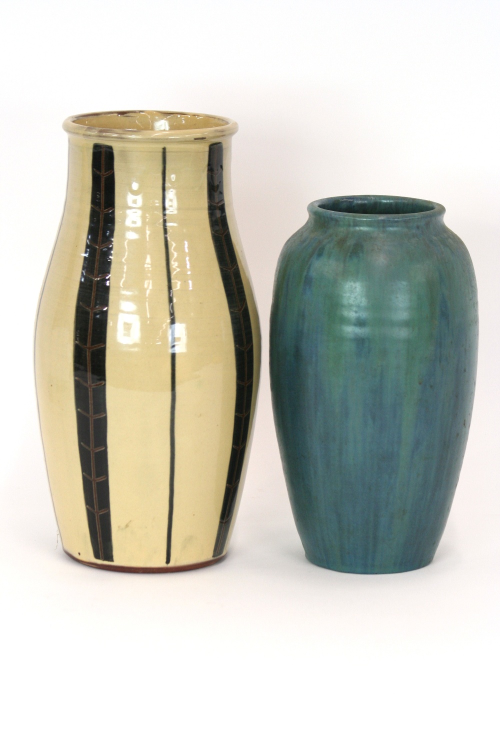 A Studio Pottery vase, decorated with running green and blue glaze, 26.