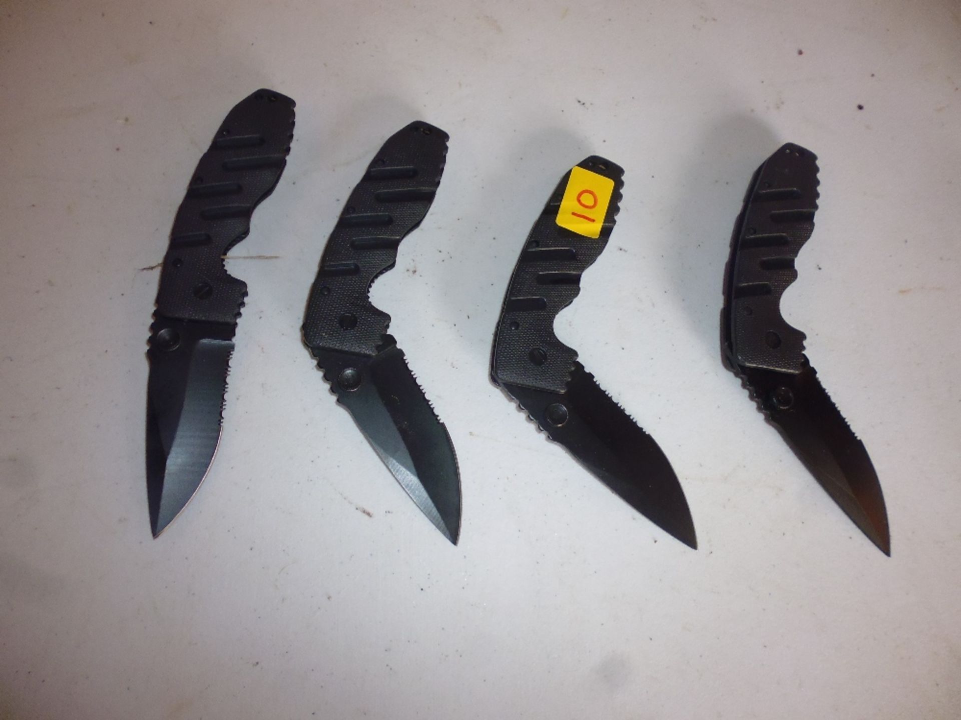 4 British army folding knives.
