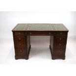 A Georgian style mahogany pedestal writing desk,