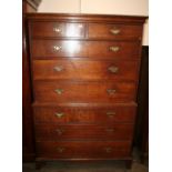 A Georgian oak tallboy chest, the upper section fitted two short and three long drawers,