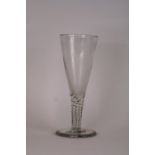 A large 19th Century glass goblet, raised on twist stem, circular spread foot,