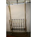 A brass half tester bedstead, 3ft 6ins, 107cm wide,