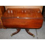 An early 19th Century mahogany drop leaf supper table,