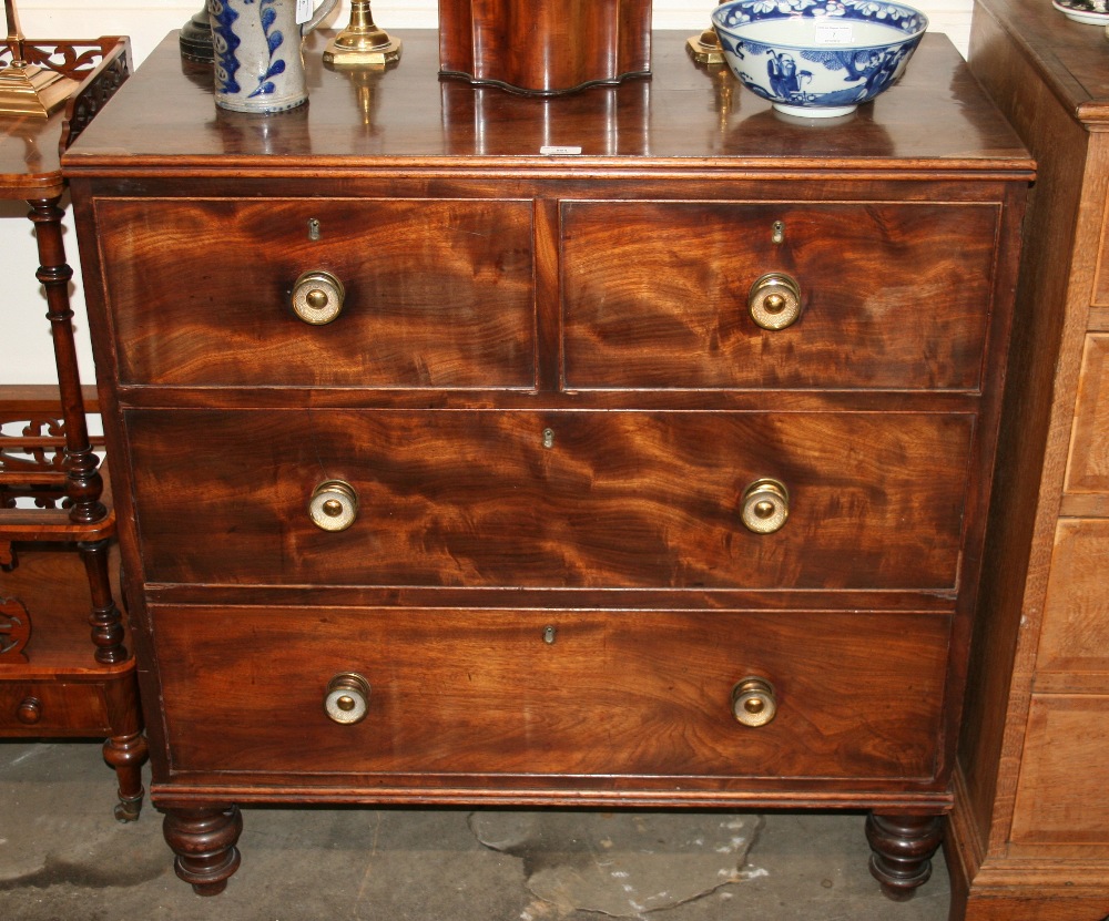 A George IV mahogany chest of two short and two long drawers,