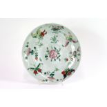 A 19th Century Chinese plate, decorated flowers, 22.5cm dia.