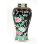 A 19th Century Chinese famille noir baluster vase, red scroll mark to base,