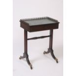 A Regency rosewood ladies writing table, of small proportions, fitted with a pierced brass gallery,