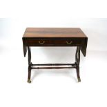 A Regency style mahogany and ebony strung sofa table,