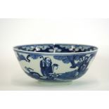 A 19th Century Chinese blue and white bowl, having blossom border,