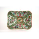 A 19th Century Canton rectangular dish, decorated in the traditional manner with panels of birds,