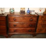 A 19th Century mahogany chest, fitted brushing slide and three long drawers, raised on bracket feet,