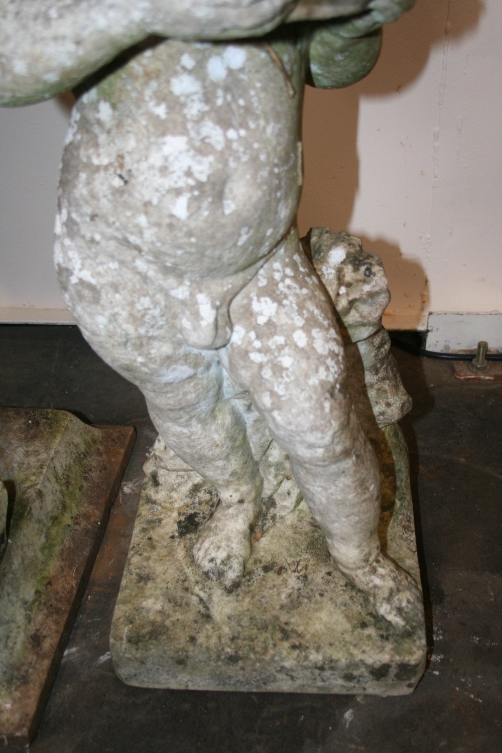 An antique marble statue, depicting a cherub leaning on a column, - Image 7 of 7