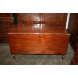 A George IV mahogany drop leaf dining table, of large proportions,