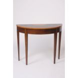A mahogany satin wood cross banded and inlaid demi-lune side table,