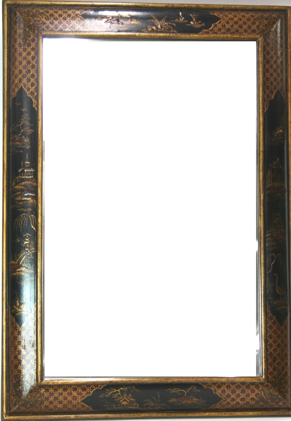 A chinoiserie decorated cushion frame wall mirror, having bevelled plate,