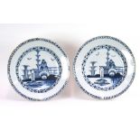 A pair of 18th Century Delft chargers, having stylised borders,