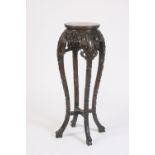 A Chinese carved hardwood cache pot stand,