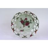 An 18th Century English porcelain scallop bordered plate, decorated foliate sprays and butterflies,