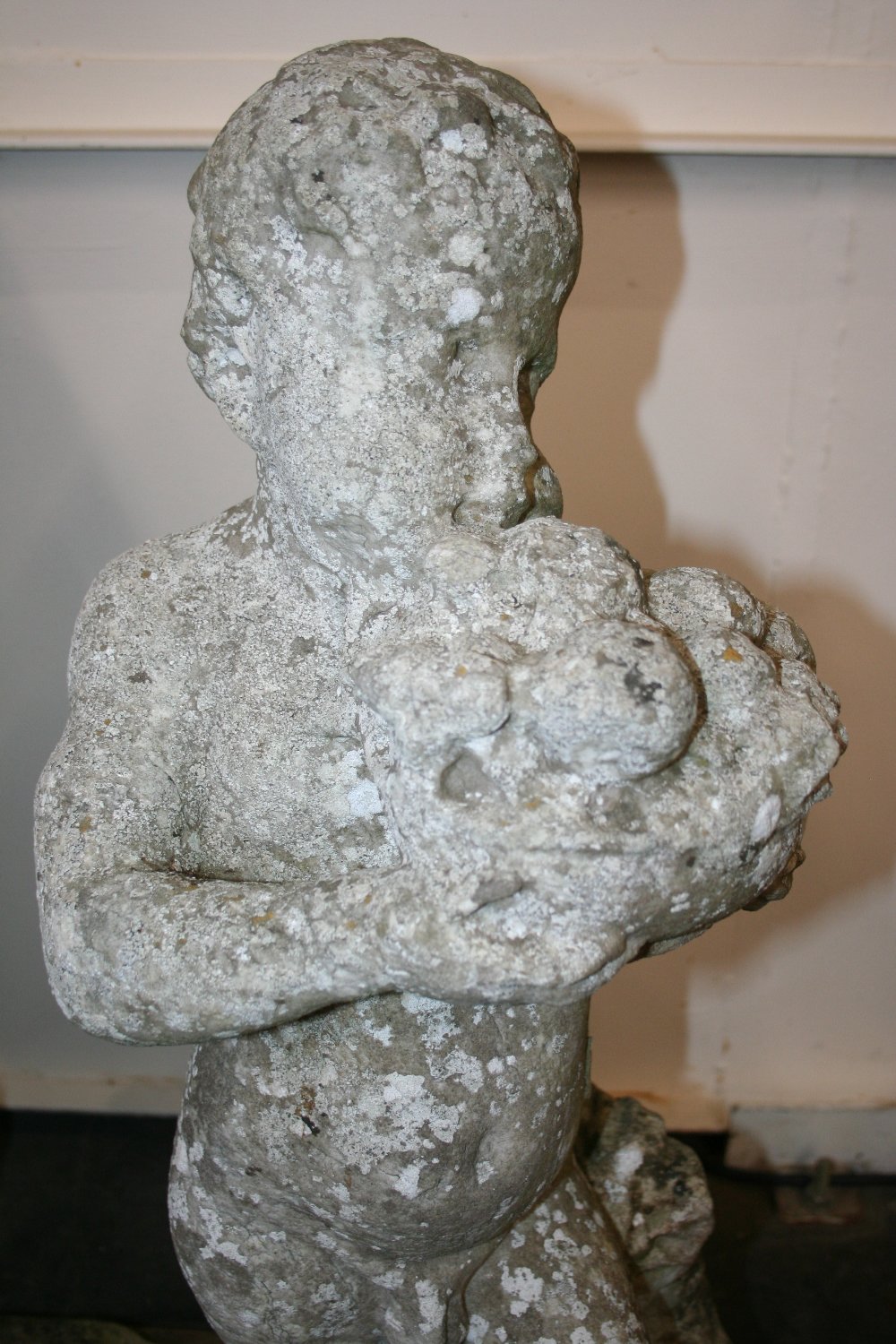 An antique marble statue, depicting a cherub leaning on a column, - Image 6 of 7