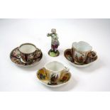 A 19th Century Meissen style chocolate cup and saucer,