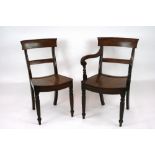 A set of 8 early 19th Century mahogany bar back dining chairs, with solid seats,