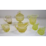 An oval pressed glass cream jug in pearlised primrose by G. Davidson & Co., a covered sugar bowl and