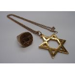 A 9ct gold Star of David pendant with te
