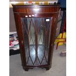 Small mahogany finish single door corner