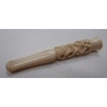 An ivory cheroot holder with carved band