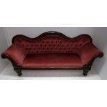 A Victorian mahogany settee with serpent