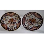 A pair of Derby porcelain plates with fl