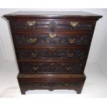 A George III oak chest of two short and