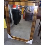 Gilt framed decorative wall mirror.