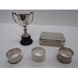 A silver trophy cup with twin scroll han