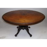 A Victorian walnut oval centre table, th