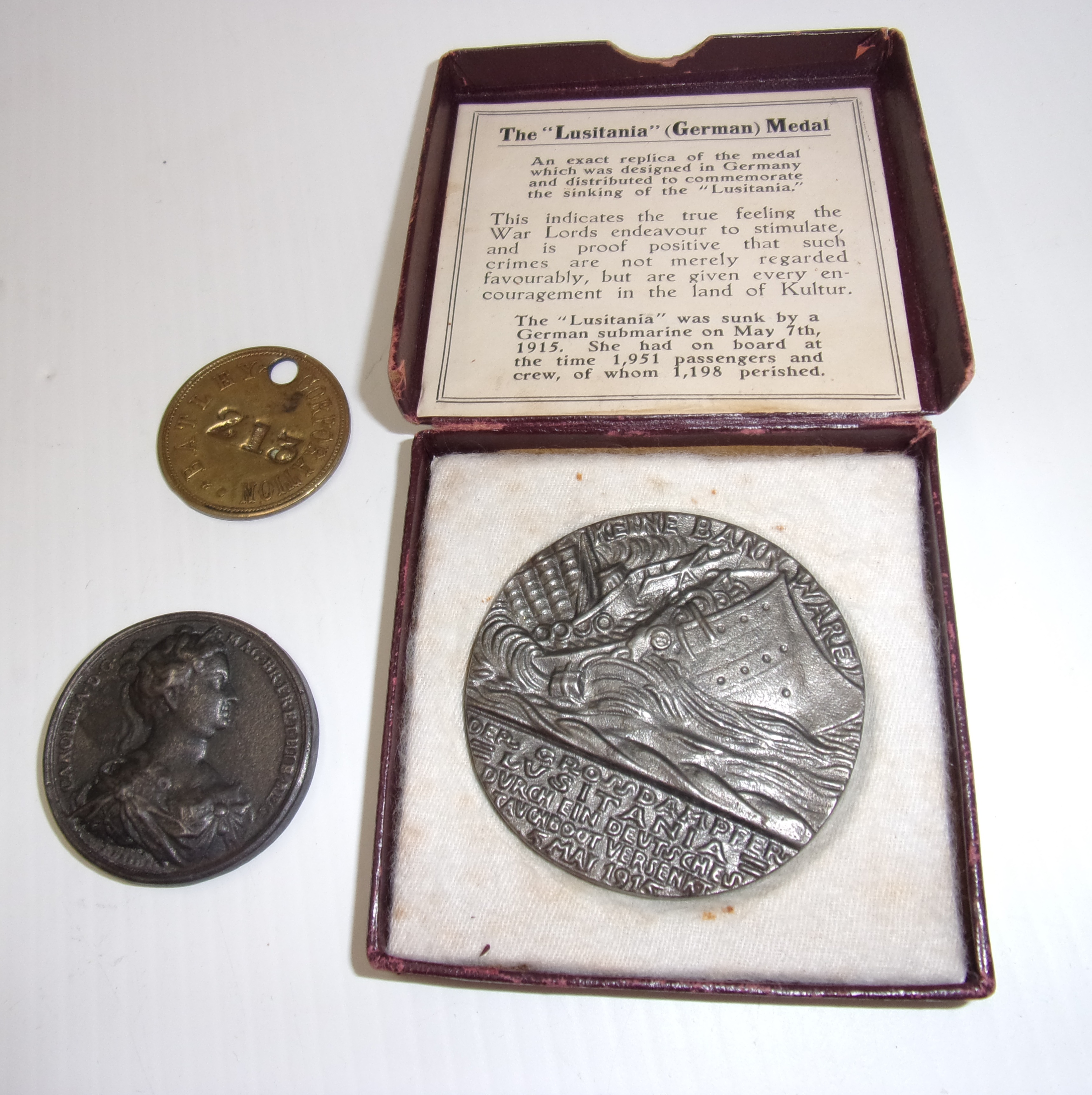 A Lusitania medal and a Geo. II and Caro