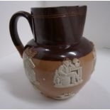 A Doulton Stoneware baluster jug with sp
