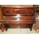 A Rimfield upright overstrung piano, in