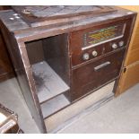 An old radiogram in wood cabinet
