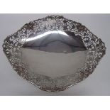 An oval silver fruit bowl with applied a