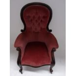 A Victorian mahogany armchair with high