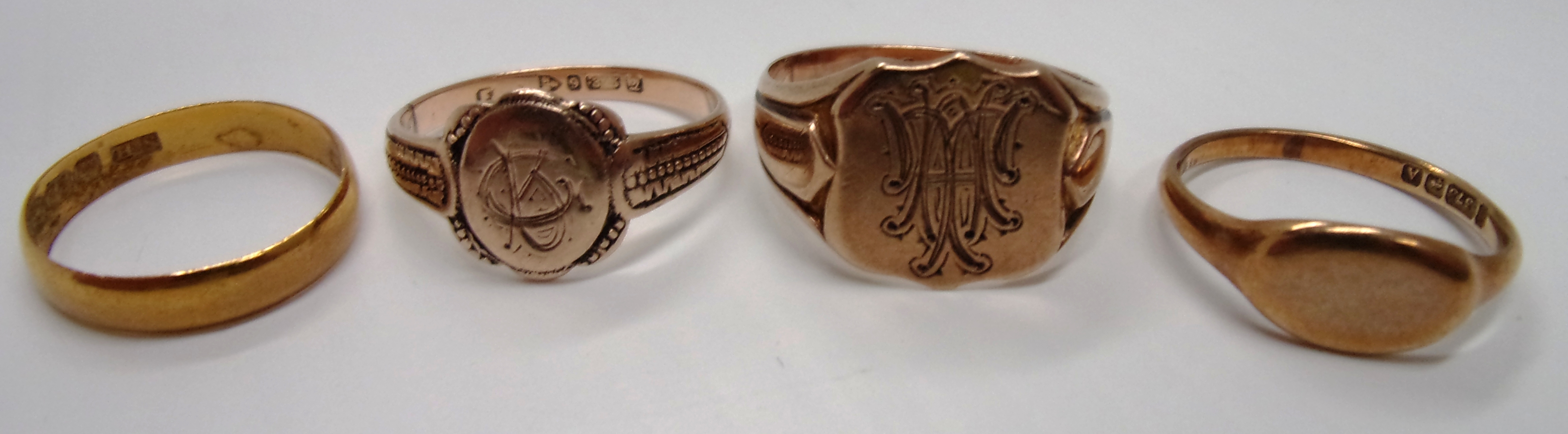 Three 9ct gold signet rings [10.3g] and