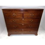 A George III mahogany chest with panel f