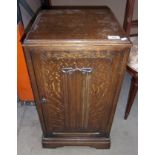 Oak single door pedestal cupboard.