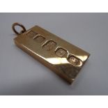 A 9ct gold ingot pendant with enlarged h