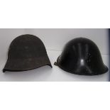 A German metal helmet with fitted leathe