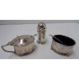 A three piece silver condiment set, the