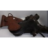 Childs brown leather saddle and an adult