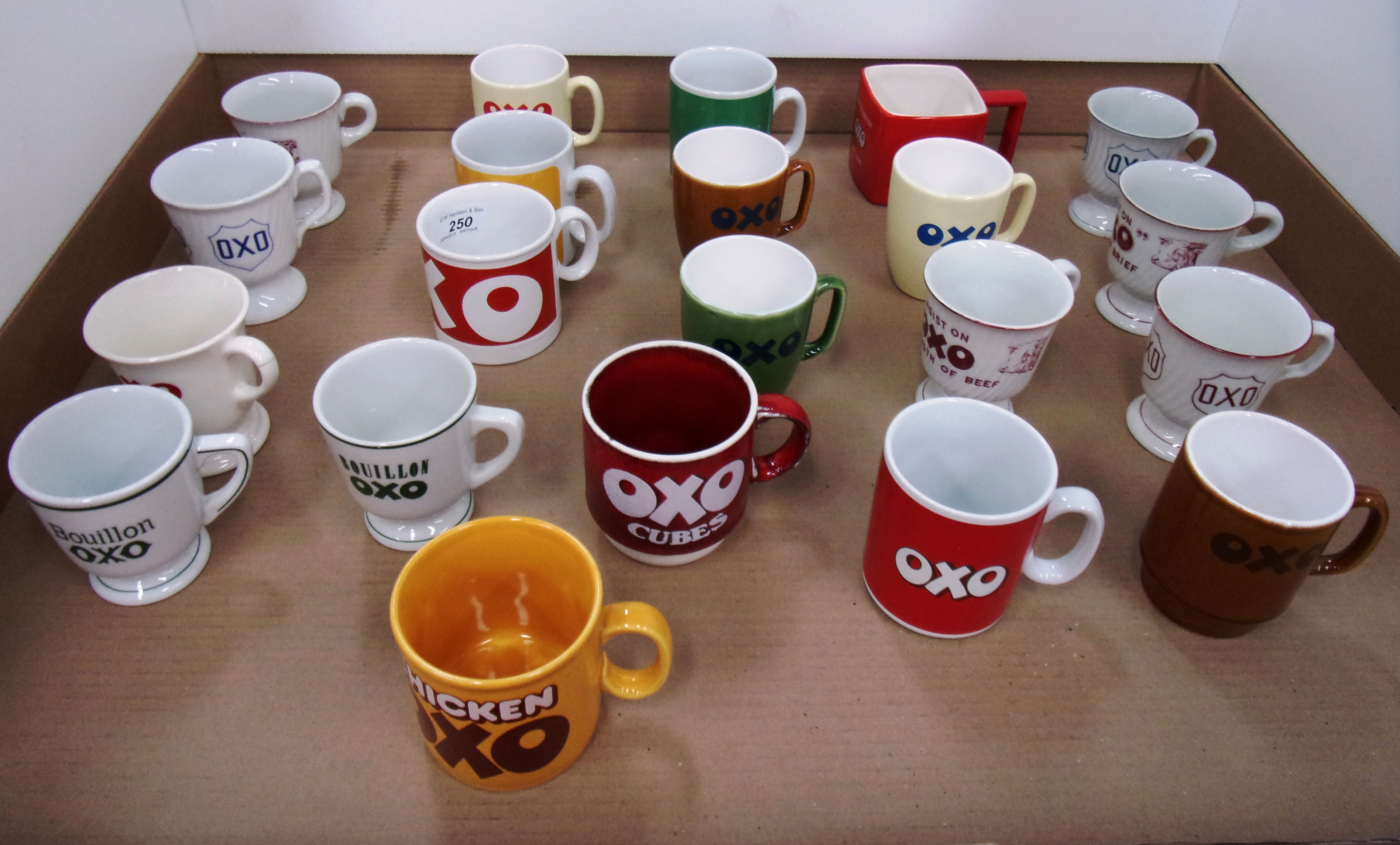 A collection of 21 ceramic promotional m